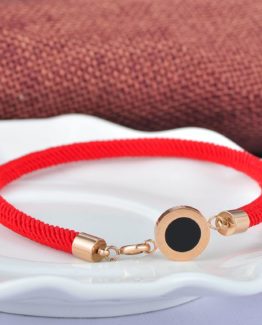 Get a unique style with this red string bracelet